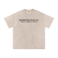 Beige t-shirt with text on a white background