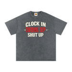 Gray t-shirt with text 'Clock In Drink Up Shut Up' on a white background