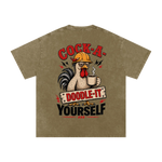 Khaki t-shirt with a rooster graphic and text on a white background