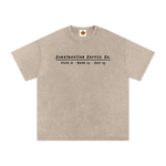 Beige t-shirt with black text on a white background
