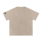 Beige t-shirt with small black logo on sleeve against a white background