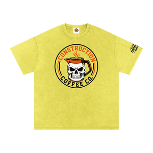 Yellow t-shirt with skull and coffee mug design on a white background