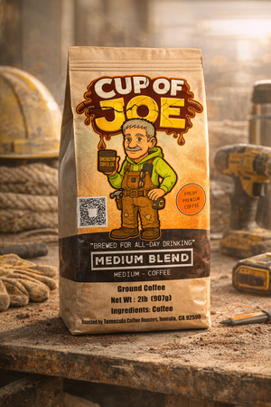 Cup of Joe coffee bag on a workbench with tools in the background
