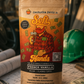 Coffee package with a person holding a coffee cup on a table with money and a hard hat.