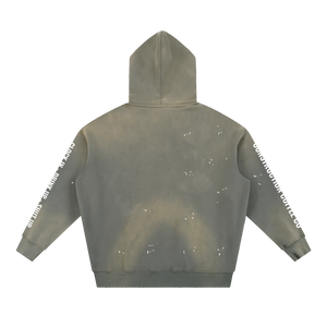 Gray hoodie with splatter design on a white background
