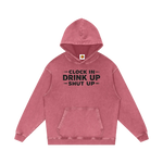 Pink hoodie with text 'Clock In Drink Up Shut Up' on a white background