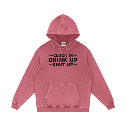 Pink hoodie with text 'Clock In Drink Up Shut Up' on a white background