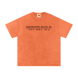 Orange t-shirt with black text on a white background