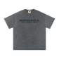 Gray t-shirt with text on a white background